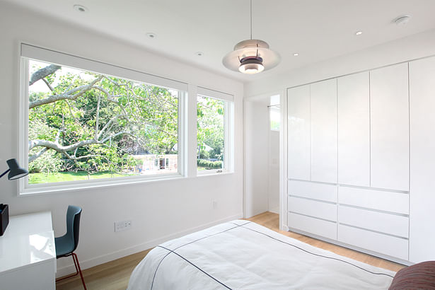 The Kids Bedrooms Include Built-In Wardrobe Cabinets In Place of Closets