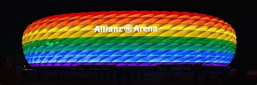 Allianz Arena illuminated for Christopher Street Day in Munich. Image courtesy Wikimedia Commons user Sinnbildner.