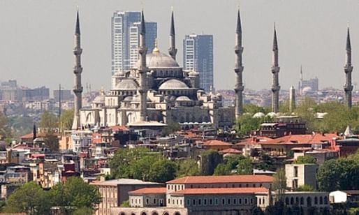 Coming down … The OnaltiDokuz towers in Istanbul, shown here looming above the Blue Mosque, now face demolition after a court order. (The Guardian; Photograph: Avrupa)
