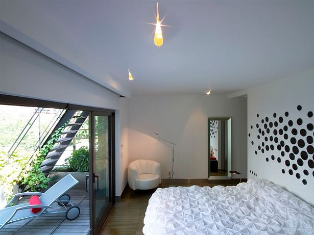 Master Bedroom with Emilio Garcia wall Installation