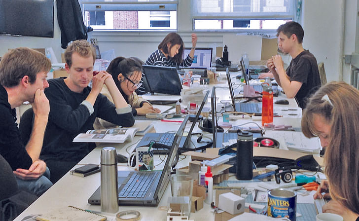 Avery Hall architecture studios, student life with students (l-r) Chris Botham, Matthew Lohry, Rae Zhuang, Melody Siu, Nickolas Mingrone, and Clara Dykstra. Image courtesy of Columbia GSAPP.