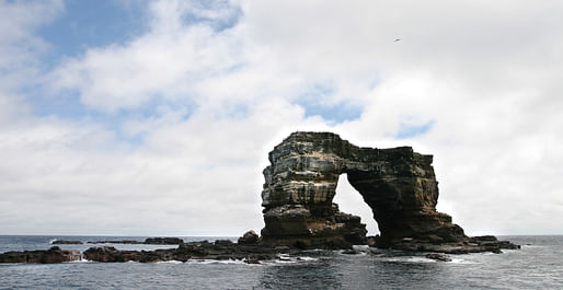 The US Military has been allowed to use the Galapagos Islands as a military base by the government of Ecuador. Pictured: Darwin's Arch off of the islands. Image courtesy of Flickr user Refractor.