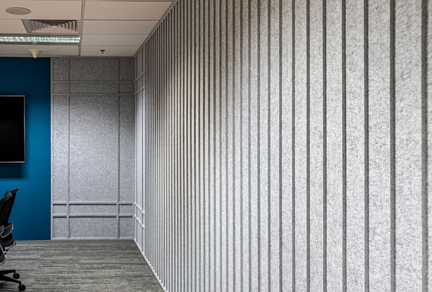 Office interior of Forrester Singapore with recycled materials used for grey acoustic panels for an environmentally friendly yet stylish design, done by Space Matrix