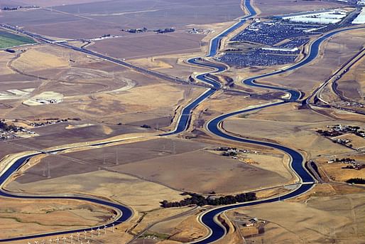 This aerial view shows the California Aqueduct at the Interstate 205 crossing west of Tracy. (Image via Wikipedia)