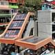 The escalators in Medellín's Comuna 13 have become a tourist attraction for international urbanists. Locals seem glad to have the visitors (Christopher Swope/Citiscope)
