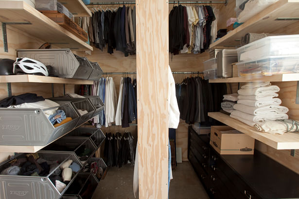 The use of finished and exposed plywood and cement contributed to the funky and chic interiors- even in the closet!