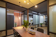 Redefined A Compact Office Interior with a Log