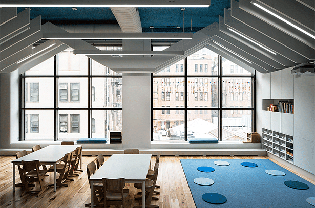 Classrooms were designed to harvest and accentuate natural light from the full-height windows.
