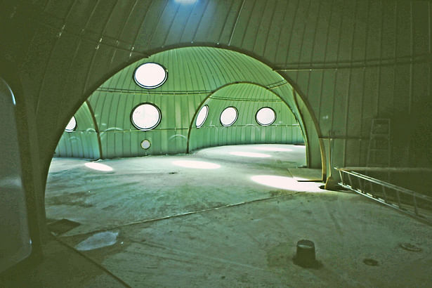 interior view during construction of the four merged exterior domes before the interior domes and insulation were assembled. 