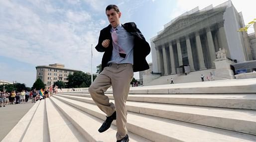 In this widely-circulated image, Scotusblog.com intern Dan Stein ran with news of affirmative action ruling front of the U.S. Supreme Court building June 24, 2013 in Washington DC. Soon, the question of internships - unpaid internships especially - may make it higher up the legal ladder...