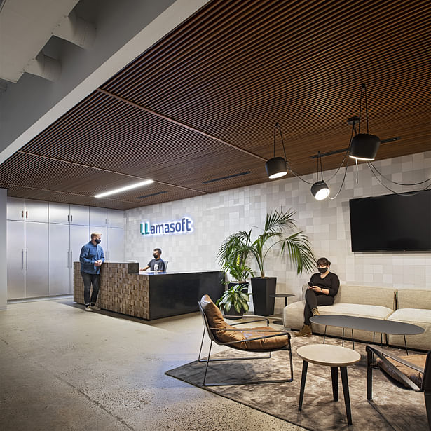 Reception lobby with custom reception desk fabricated by Synecdoche. Photo by: John D'Angelo