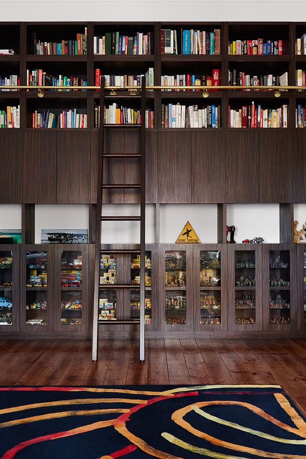 RESTORED ORIGINAL FRONT ROOM WITH THE NEW FLOOR TO CEILING LIBRARY BOOKSHELVES