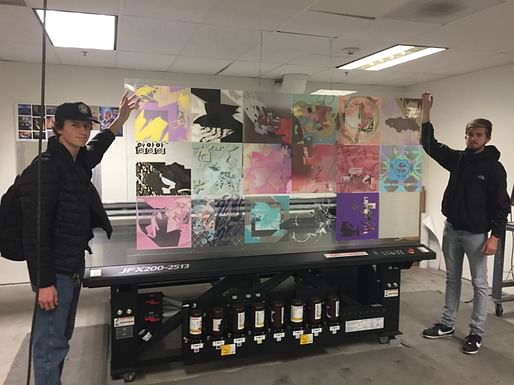 Students Benjamin Sperry and Christian Coley finish printing their classmates' work on acrylic. Instructor: Kirill Volchinskiy