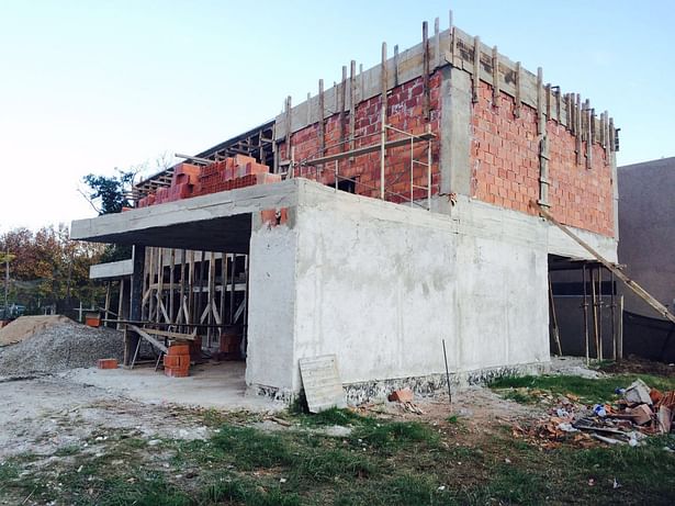 Photograph - Front Facade Under Construction. (Image of shared autorship)