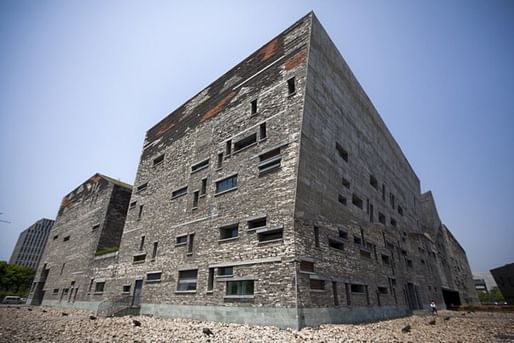 This April 22, 2012 photo shows Ningbo History Museum, one of Chinese architect Wang Shu’s most famous works, in Ningbo, in eastern China’s Zhejiang province. When Wang accepts his field’s richest prize in a ceremony Friday, May 25, 2012, at the seat of China’s legislature, a symbolic...