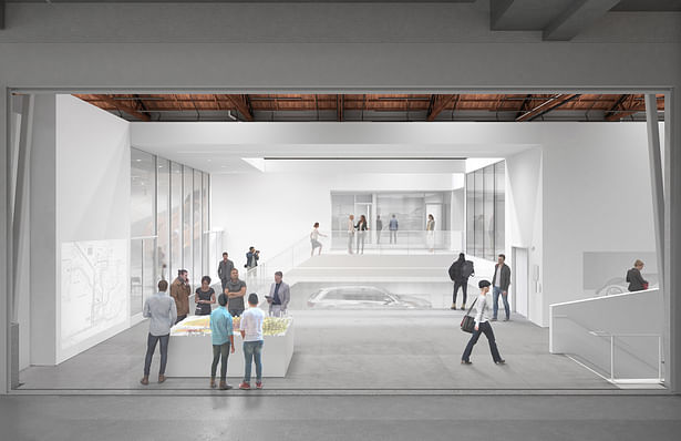 At the upstairs window, connecting MTDC to the neighboring building, looking across the viewing deck towards the faculty offices. On the left and right are the flex lecture and the upper division undergraduate studio. 