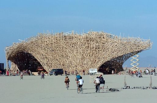 Conceptual artist Arne Quinze designed a 15-story structure named “Uchronia” at the Burning Man festival in Black Rock City, Nev., in 2006. The structure, which was quickly dubbed “The Belgian Waffle,” was burned during the closing hours of the annual event. (The Boston Globe; Photo: Ron Lewis/Associated Press/File)