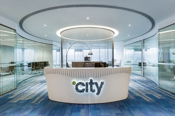 We put in glass walls on this side of the office, and glass-walled partitions are used in the interiors as well, so as to create minimum visual interruptions through the space - City Facilities Management in Hong Kong by Space Matrix