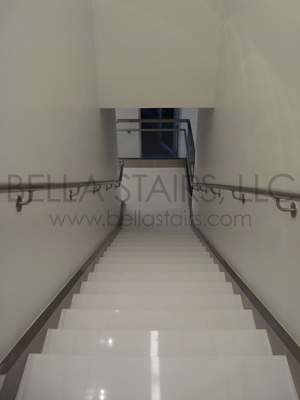 Stainless Steel Handrails are Wall Mounted in this Stairwell.