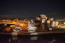 Gehry's Guggenheim Bilbao lights up covered in Jenny Holzer projections this week