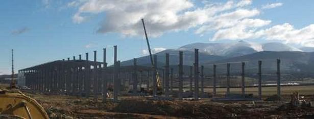 Assembling the main building structure.