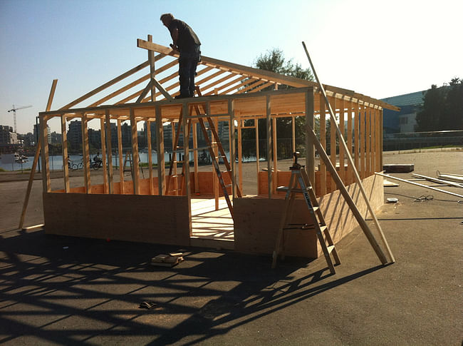 Construction of the prairie farmhouse. 'Industry and the Sleepwatchers' by Jay Senetchko. Photo courtesy of Jay Senetchko. 