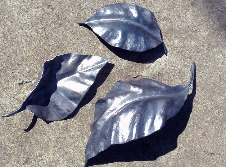 Leaves: formed from sheet steel on the fly press.