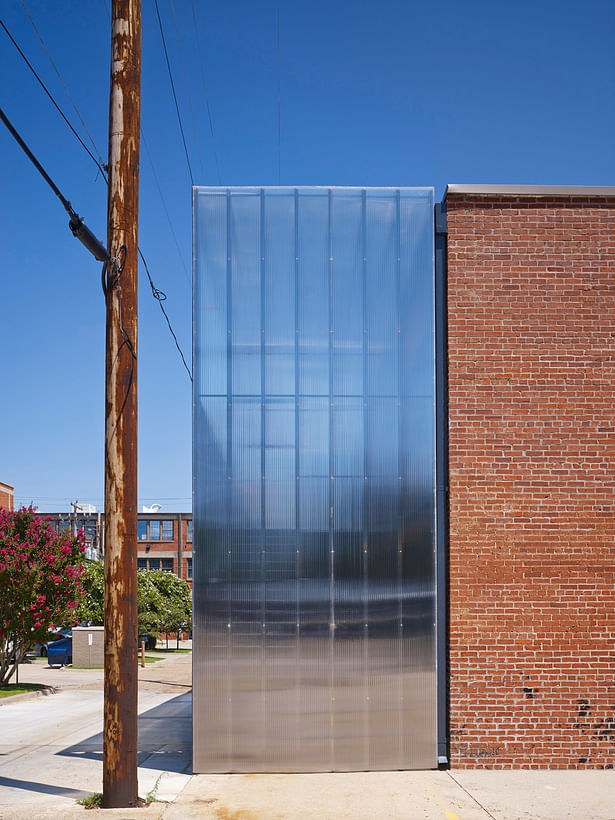 This is the northwest corner showing the polycarbonate addition on the north side. We embraced the alley aesthetic.