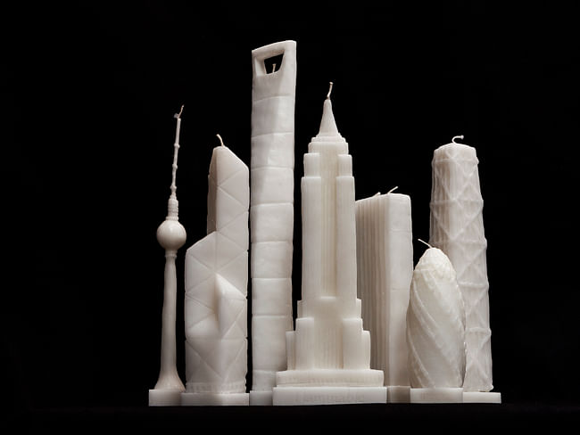'Flammable' by architect Jingjing Naihan Li scales down the world's most celebrated skyscrapers into wax candles. Image via naihanli.com