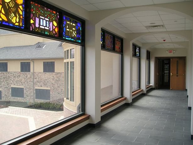 Hall to Education wing - with relocated stained glass