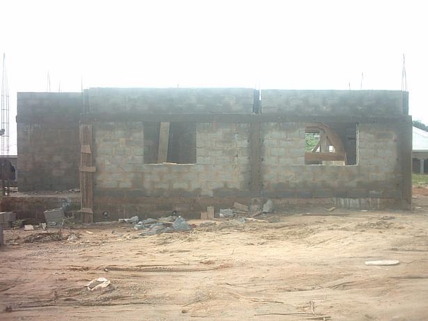 Block work up to the lintel and above.