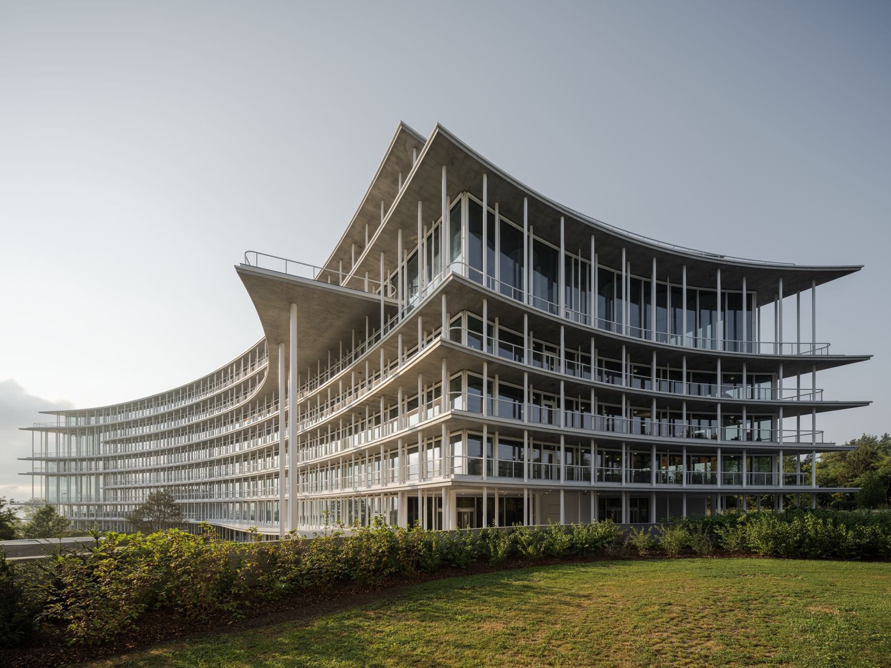 Herzog & de Meuron completes Geneva headquarters with thin, curved