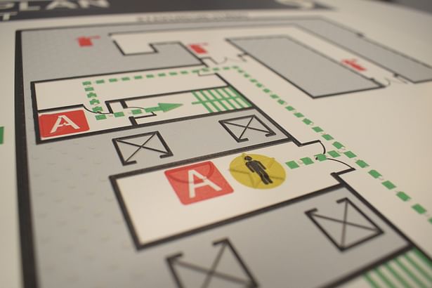 Detail of You Are Here symbol on tactile evacuation map.