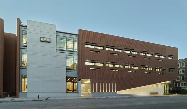 South elevation at dusk.