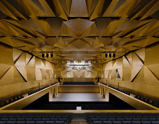 Concert hall inside the Philharmonic Hall Szczecin, designed by Barozzi / Veiga. Photo © Simon Menges