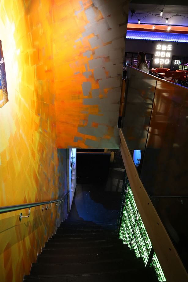 Staircase to the second floor: a local artist created the wall drawing