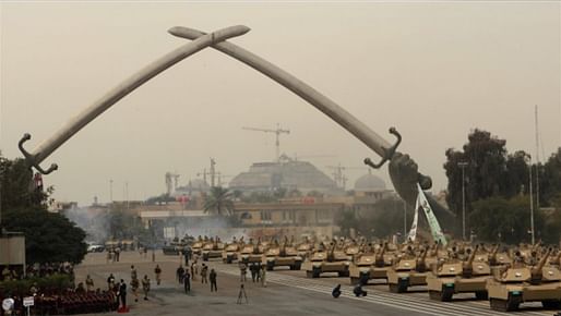 Surprising or not, the hands of Baghdad's iconic Victory Arch had been modeled on Saddam’s own. (Image via failedarchitecture.com)
