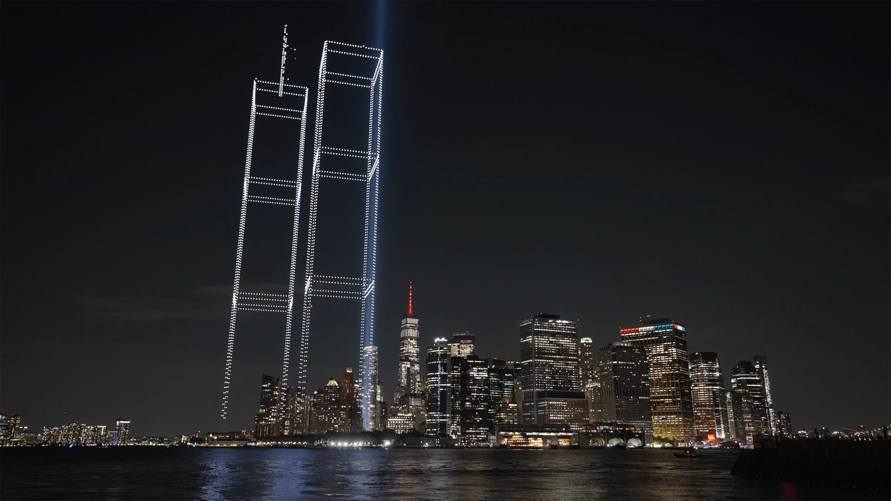 2,977 lights rebuild the Twin Towers in 9/11 tribute over New York Harbor