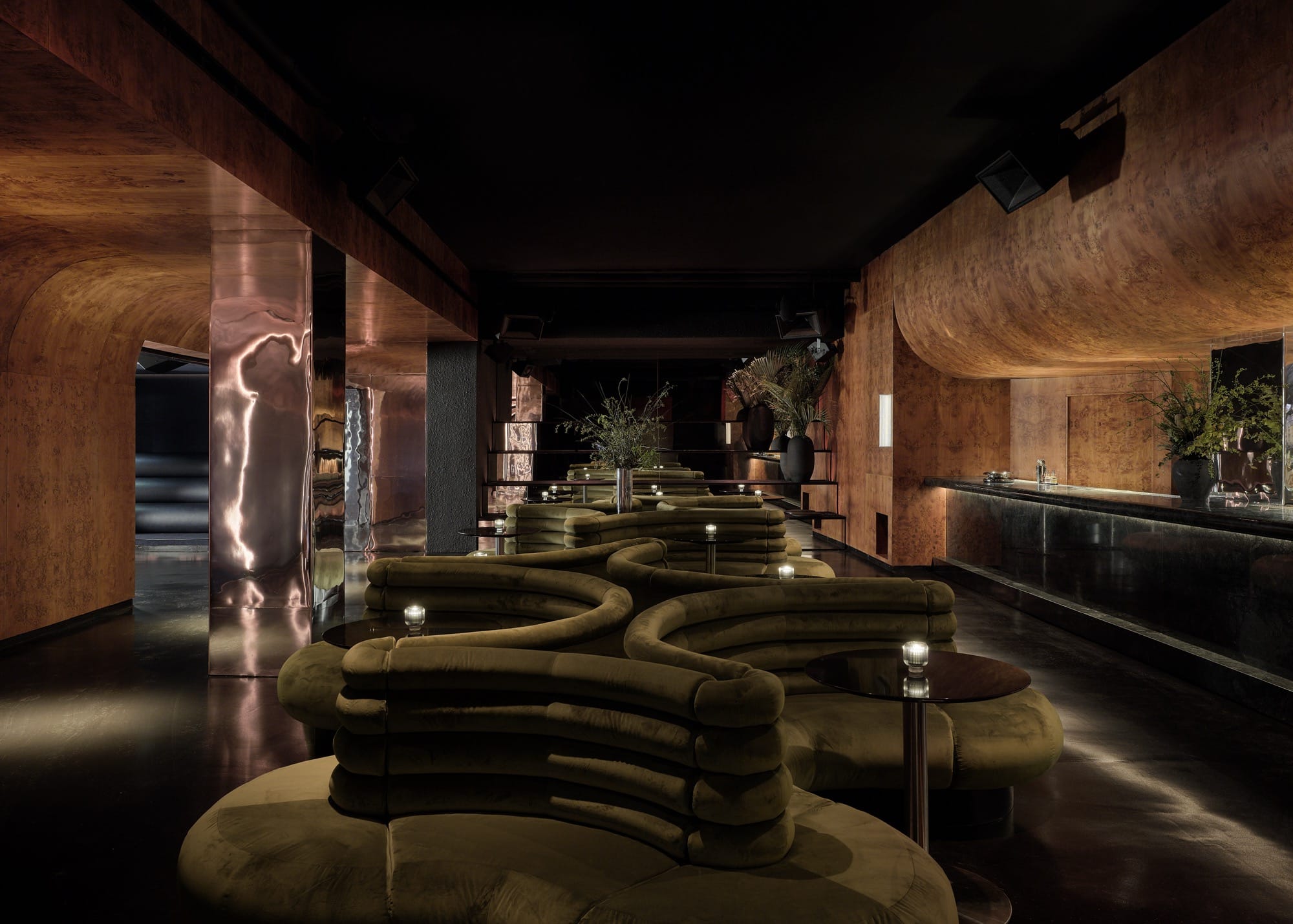 Subterranean Brooklyn nightclub uses burl wood and aluminium to create ...