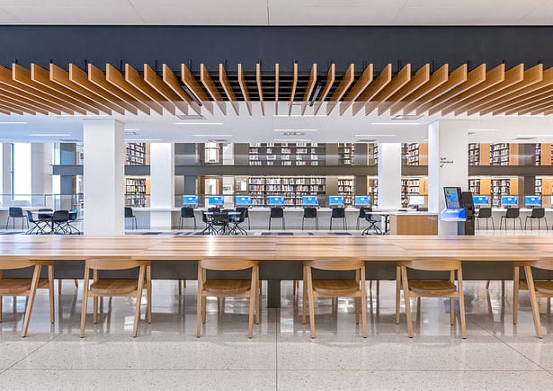 The materiality of the library contributes to that user experience, for example in terrazzo flooring and travertine presented in the elevator banks. Image copyright by Max Touhey