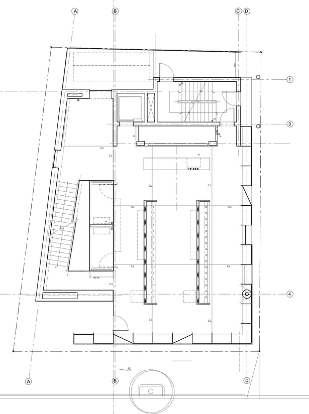 First Floor Plan showing freestanding glass facade and showcases which act as chase pedestals for delivery of HVAC and concealed up lighting.