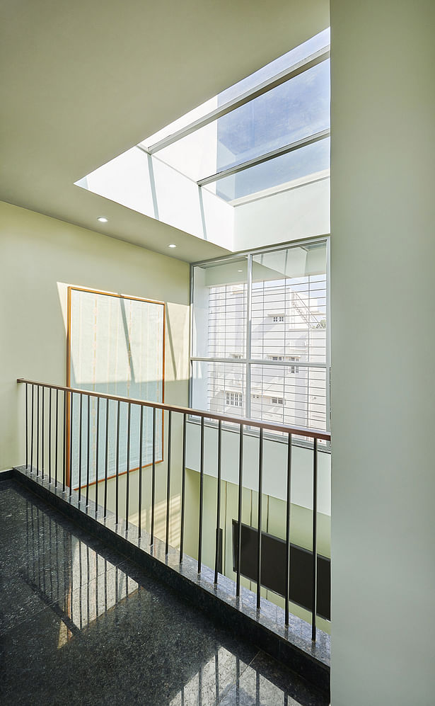 Feeling of Expanse - The Bridge The positioning of the double heights created a small connecting bridge at the 2nd floor – a vibrant viewpoint that gives an elevated floating sensation making the house seem large yet light.