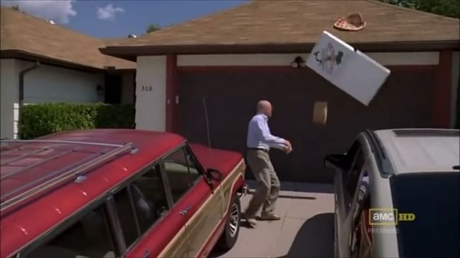 Walter White chucks a frustration pizza onto his roof. 