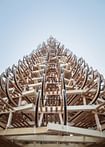 Hello Wood uses 365 sleighs to build an 11-meter Christmas tree in Budapest