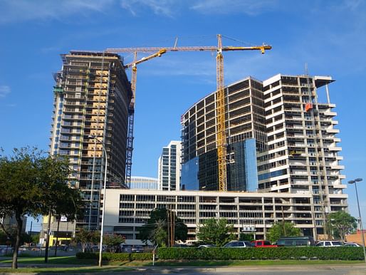 A high rise apartment complex under construction in Dallas, Texas. Image courtesy of Wikimedia user Mang9. 