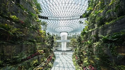 Changi Airport's Rain Vortex is a 130-foot indoor waterfall. Image courtesy of Changi Airport Group.