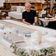 Gehry with a design model of the SELA Cultural Center, in South Gate, Calif; photo by Erik Carter for The New York Times