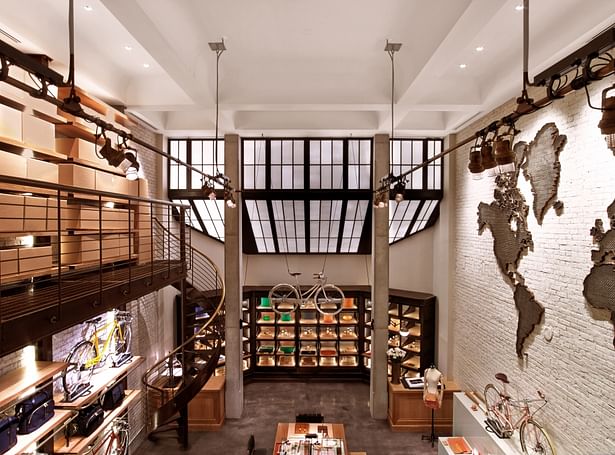 View from top of catwalk to the back of the store showing the skylight frames