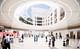 A new underground concourse, capped by a dramatic skylight, connects the subway and 30th Street Station. Image © SOM