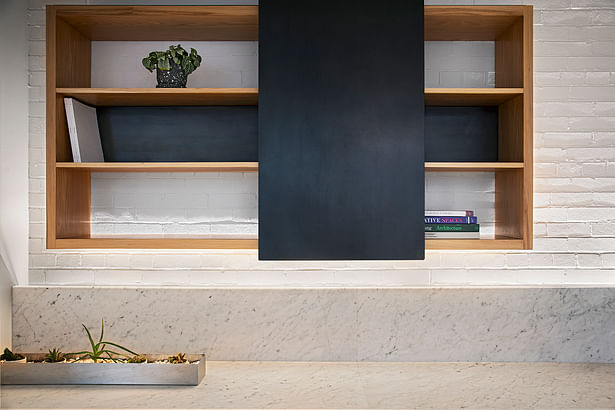 Floating shelf with sliding steel panel fabricated by Synecdoche. Photo: John D'Angelo